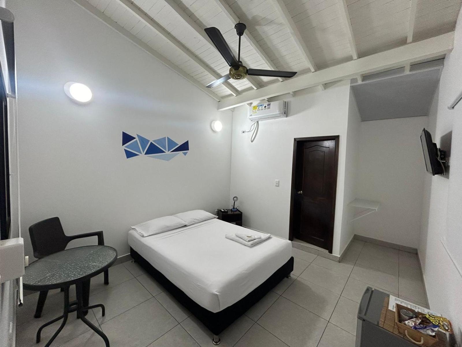 Hotel Puerto Azul Puerto Berrio Bagian luar foto